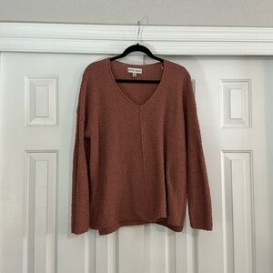 V neck sweater.